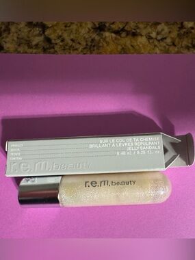 R.E.M Beauty On Your Collar Plumping Lip Gloss Jelly Sandals  – Iridescent (New)